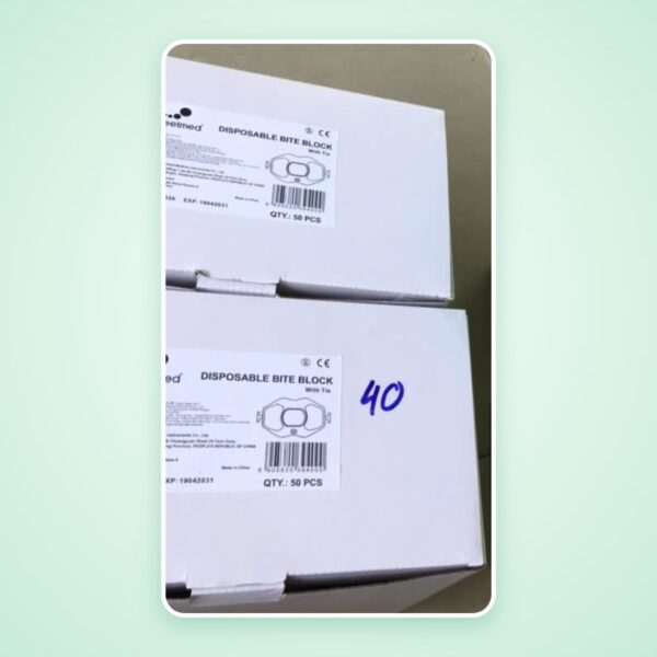 Dụng cụ chống cắn lưỡi có dây Greetmed (Disposable Bite Block with Tie)